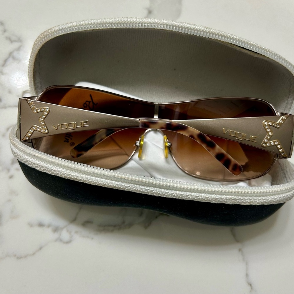 Vogue Aviator Sunglasses with Amber and Gold Details.